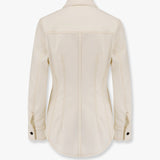 Close-up of Bottega Veneta blouses hardware and fine stitching