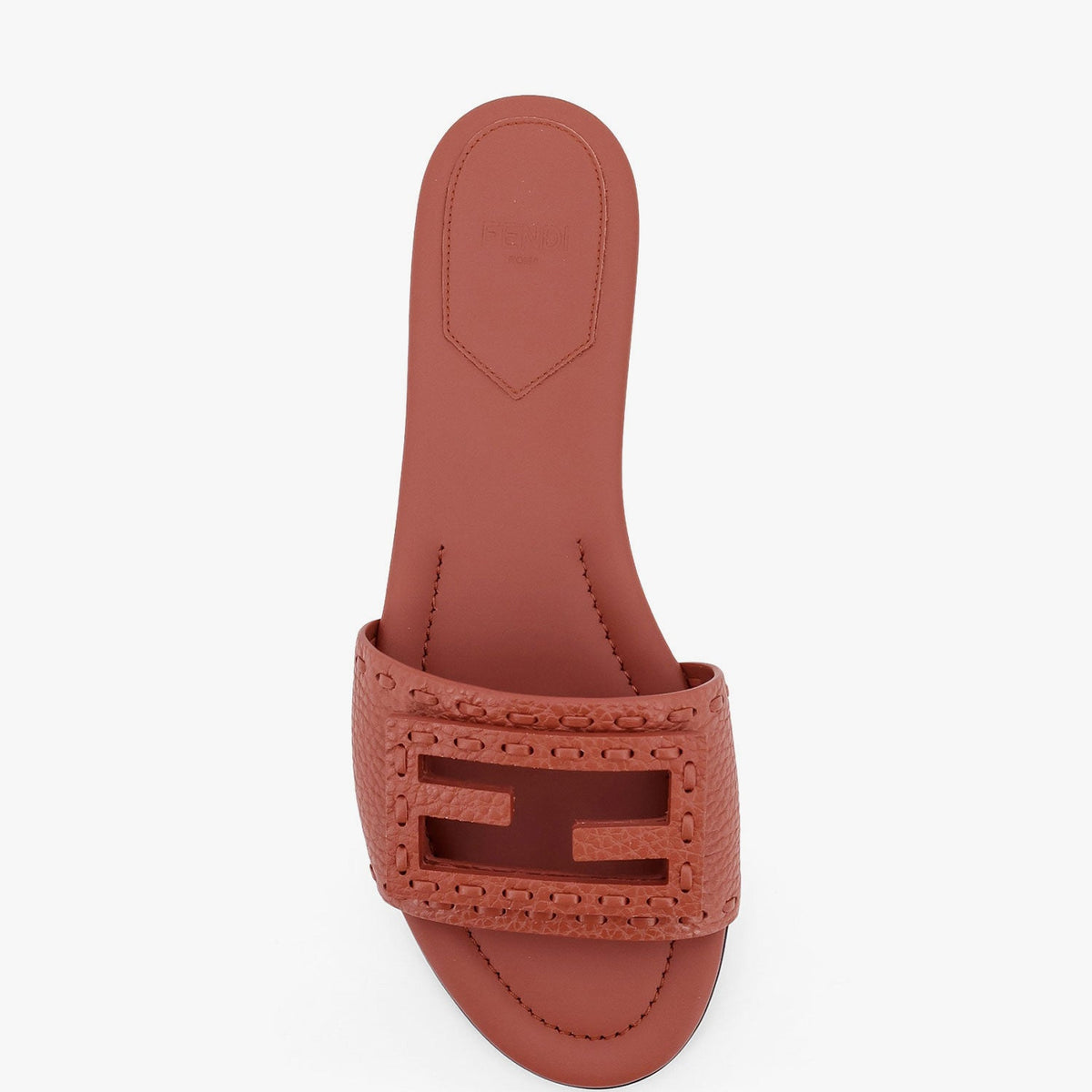 Close-up of Fendi sandals hardware and fine stitching