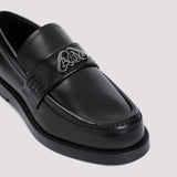 Close-up of Alexander McQueen slides hardware and fine stitching