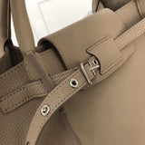 Top view of modern premium women's handbag – women's statement bag