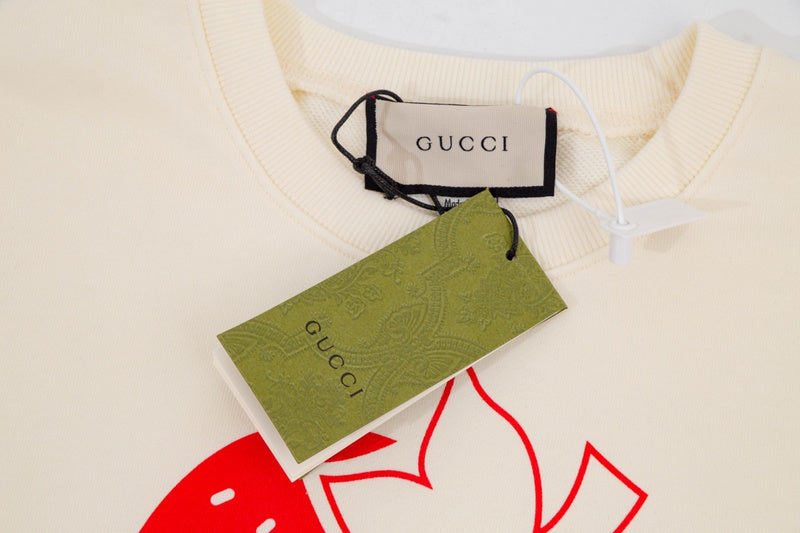 Close-up detail shot of Gucci luxury clothing with streetwear-inspired cut