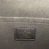 Side profile of signature polished women's handbag – women's premium purse
