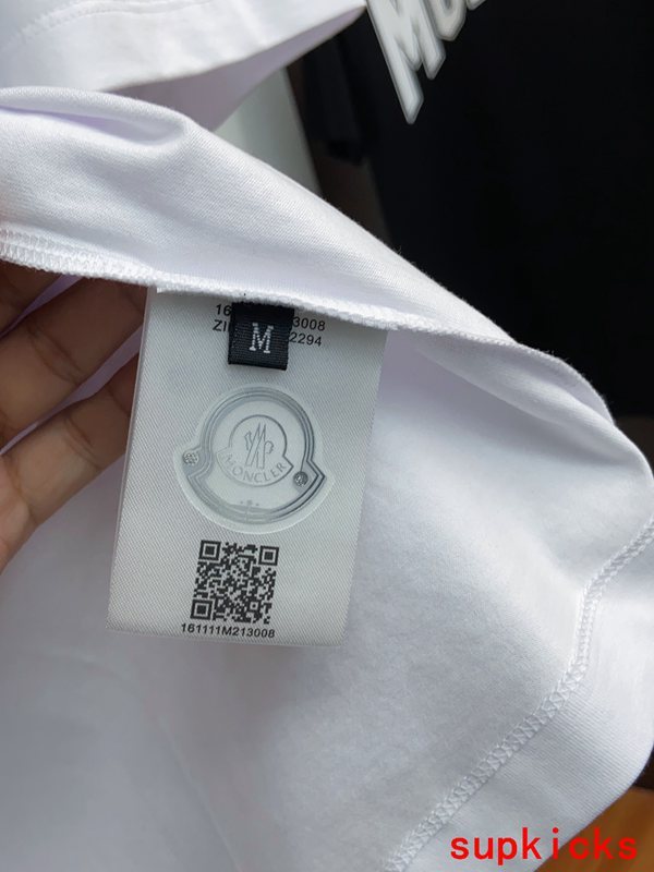 Front view of Moncler luxury clothing with contemporary cut