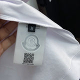 Front view of Moncler luxury clothing with contemporary cut