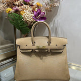  Contemporary structured bag carried on shoulder