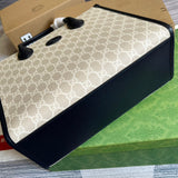 Styled lifestyle shot of everyday-luxe classic women's handbag – women's everyday handbag