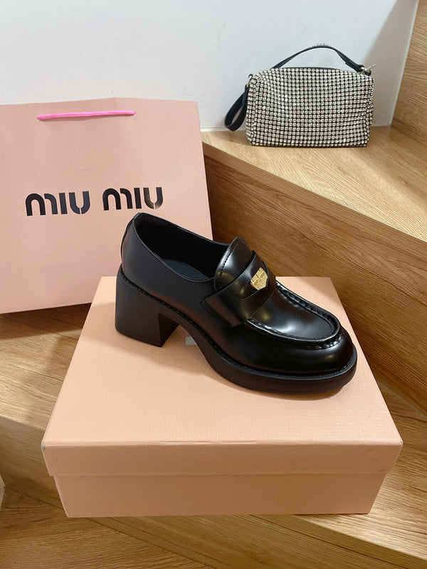 Texture and finish detail of Miu Miu luxury piece style No.111