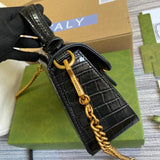 Side profile of polished elevated women's handbag – women's statement bag