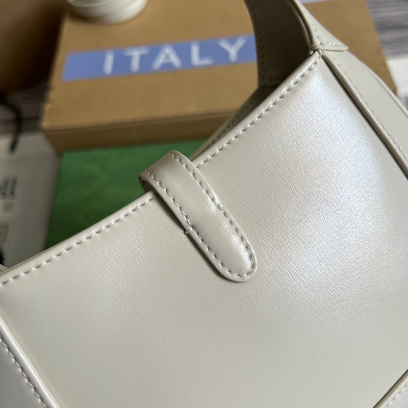 Styled lifestyle shot of statement classic women's handbag – women's everyday handbag