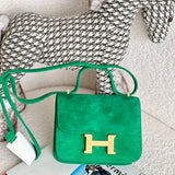 Side view of graceful structured handbag