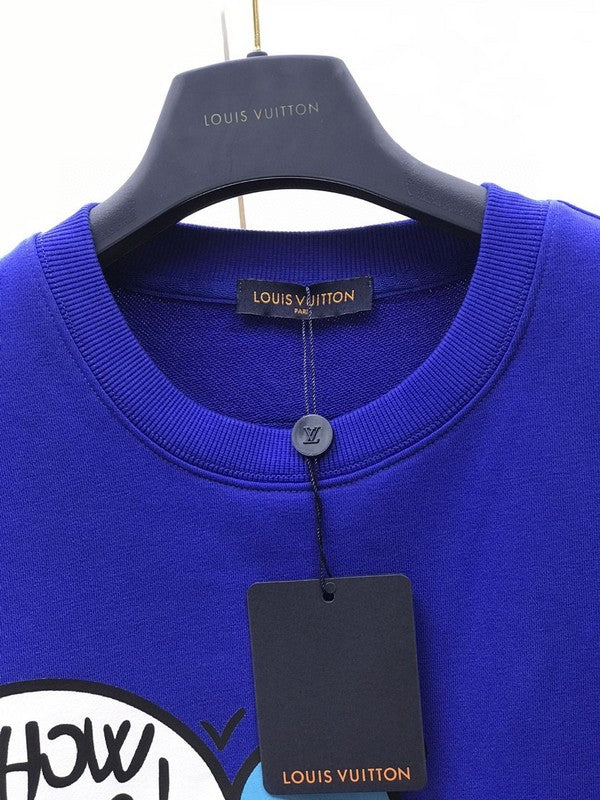 Flat lay presentation of Louis Vuitton luxury clothing with runway-inspired design