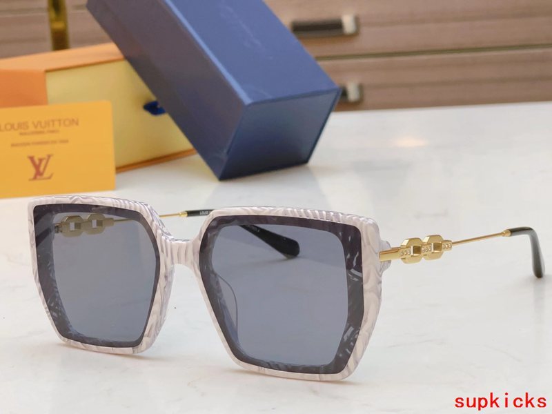 Close-up detail view of Louis Vuitton unisex sunglasses