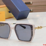 Close-up detail view of Louis Vuitton unisex sunglasses