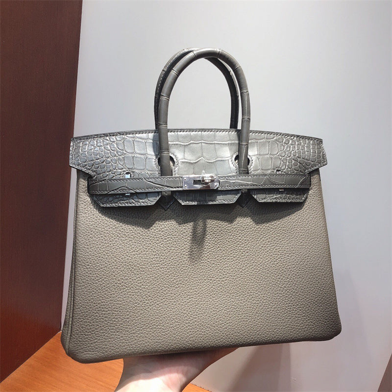 Classic handbag carried on shoulder 16