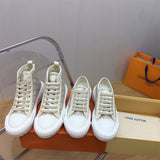 Louis Vuitton Black High-Top Sneakers - Side Profile View
