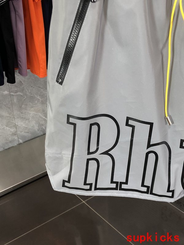 Flat lay presentation of Rhude luxury clothing with runway-inspired design
