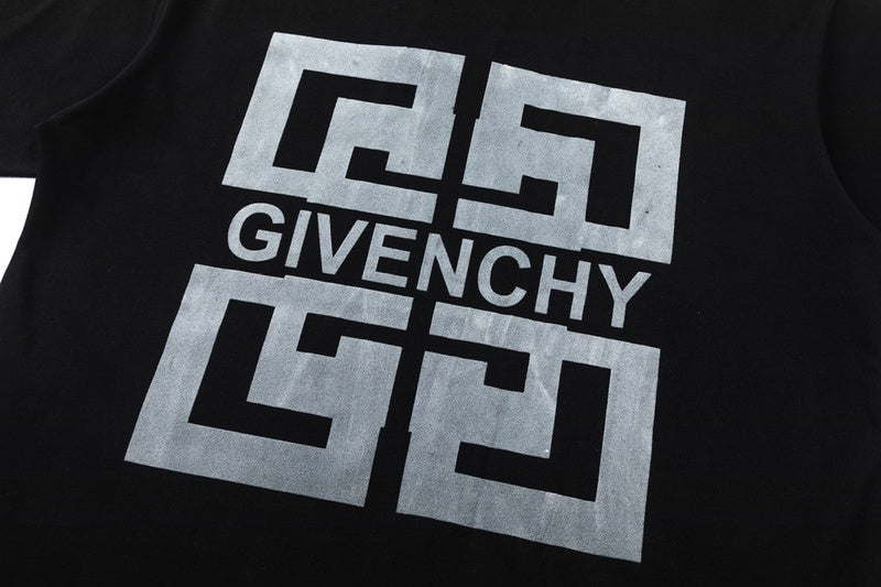 Close-up detail shot of Givenchy luxury clothing with signature branding