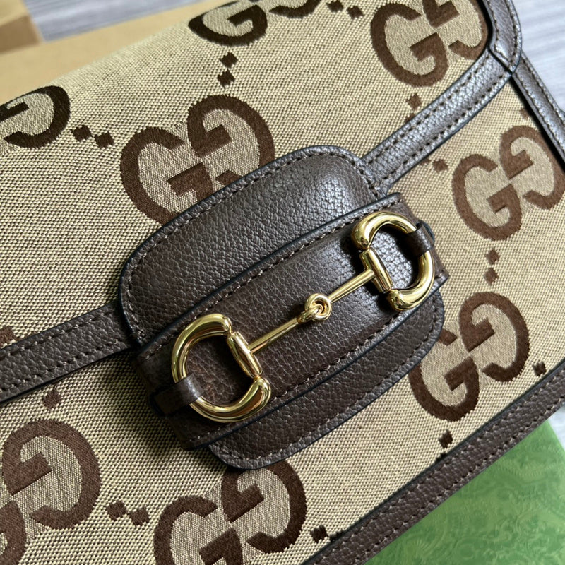 Back view of polished classic women's handbag – women's statement bag