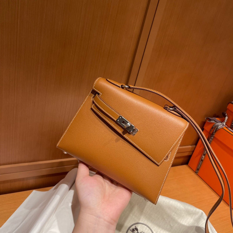 Side view of sculpted structured handbag