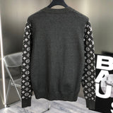 Side profile of Louis Vuitton luxury clothing with signature branding