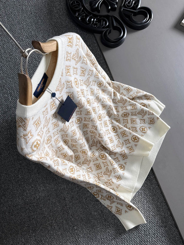 Flat lay presentation of Louis Vuitton luxury clothing with logo-detail design