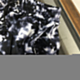 Close-up detail shot of Louis Vuitton cotton t-shirt with label-forward styling