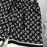 Full styled look of Louis Vuitton cotton t-shirt with label-forward styling