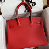 Side view of minimalist structured handbag