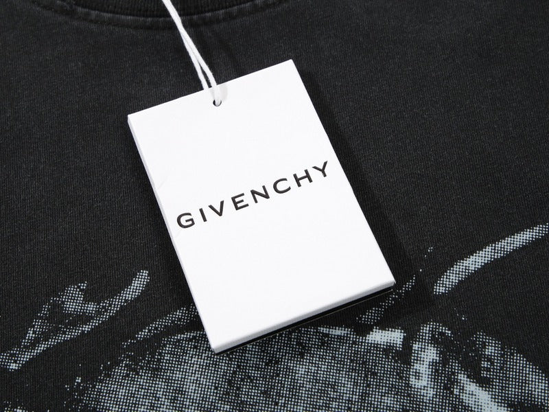 Flat lay presentation of Givenchy luxury clothing with signature branding