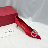 Texture and finish detail of Valentino Garavani luxury piece style No.216