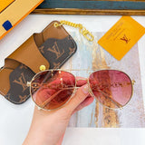 Lifestyle view of Louis Vuitton unisex sunglasses