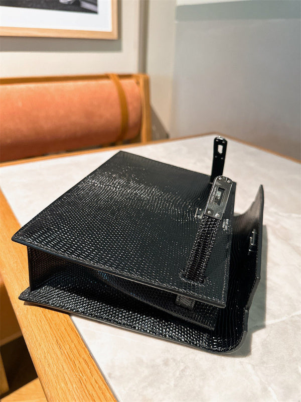 Side view of clean-lined structured handbag