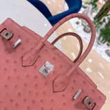 Side view of fluid structured handbag