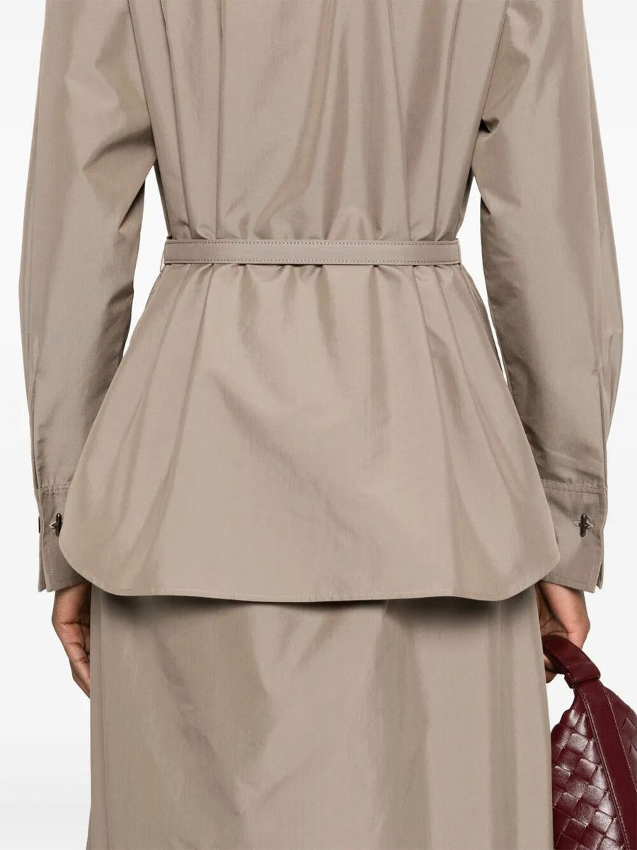 Close-up of Fendi clothing hardware and fine stitching