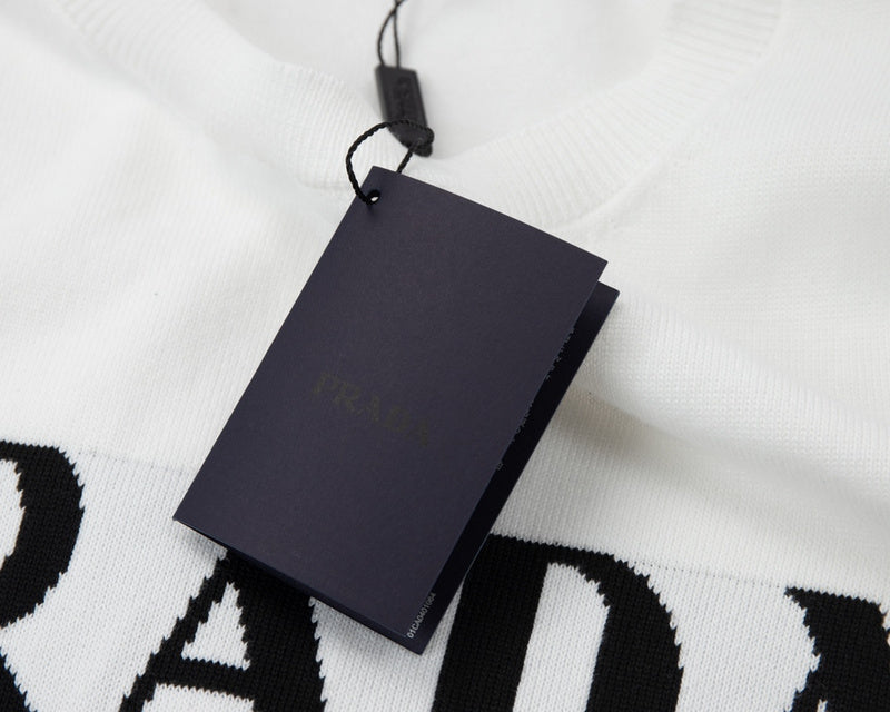 Flat lay presentation of Polo cotton polo shirt with signature branding