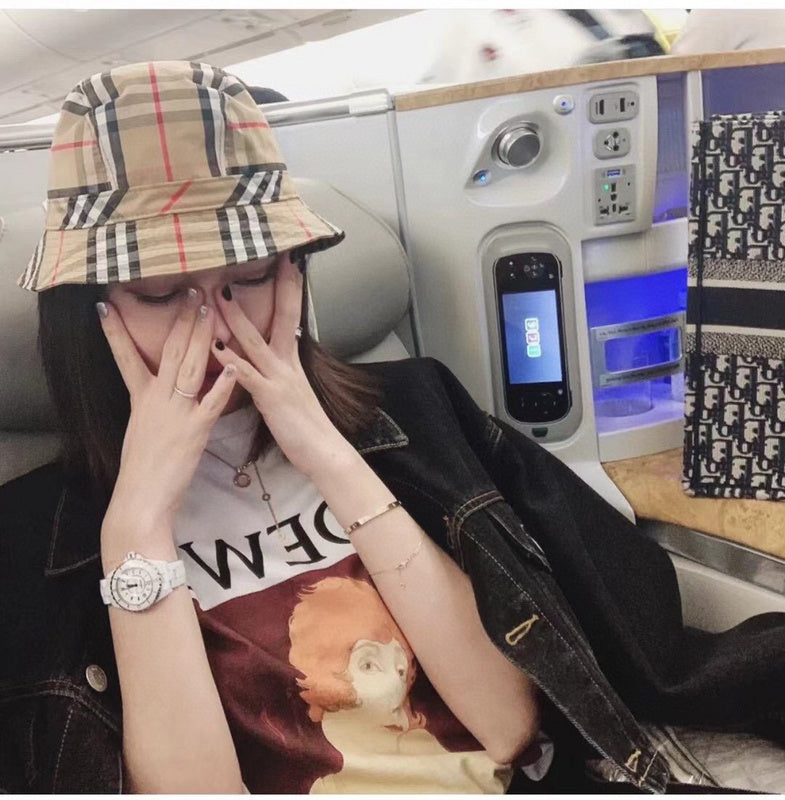 Side view of Burberry unisex cap
