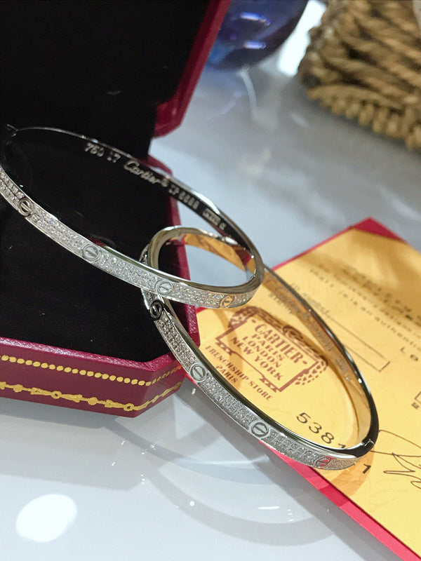 Angled view of Cartier unisex jewelry piece
