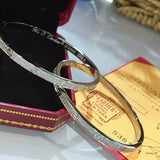 Angled view of Cartier unisex jewelry piece