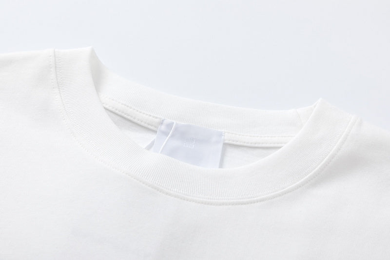 Close-up detail shot of Givenchy luxury clothing with signature branding