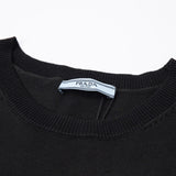 Close-up detail shot of Polo cotton polo shirt with monogram-inspired silhouette