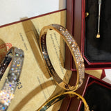 Close-up detail view of Cartier unisex jewelry piece