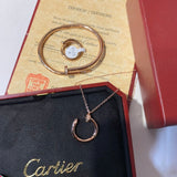 Front view of Cartier unisex jewelry piece
