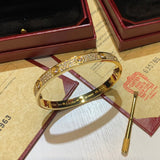 Close-up detail view of Cartier unisex jewelry piece