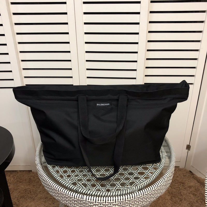 Front view of elevated sleek women's handbag – women's luxury handbag