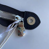 Front view of chic premium women's handbag – women's statement bag