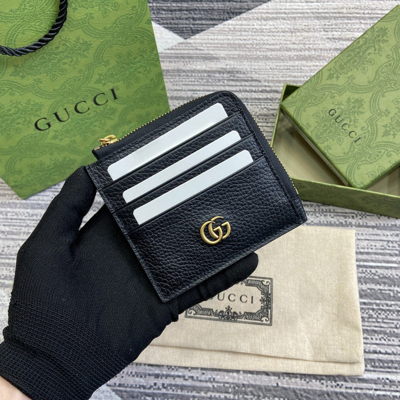 Handle and strap detail of modern polished women's handbag – women's statement bag