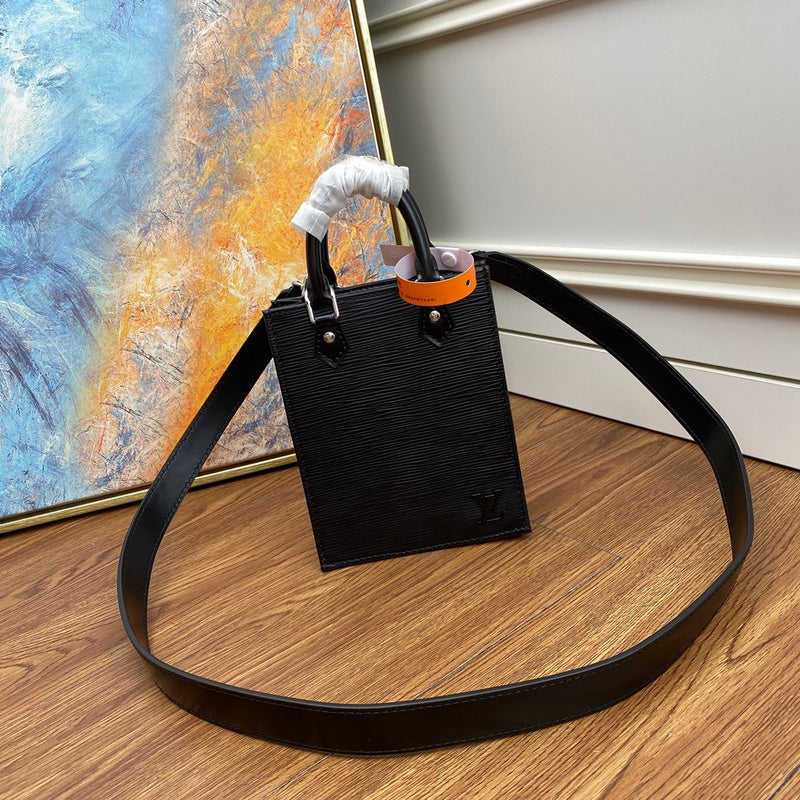 Front view of refined elevated women's handbag – women's luxury accessory