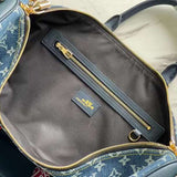 Front view of modern sleek women's handbag – women's luxury accessory