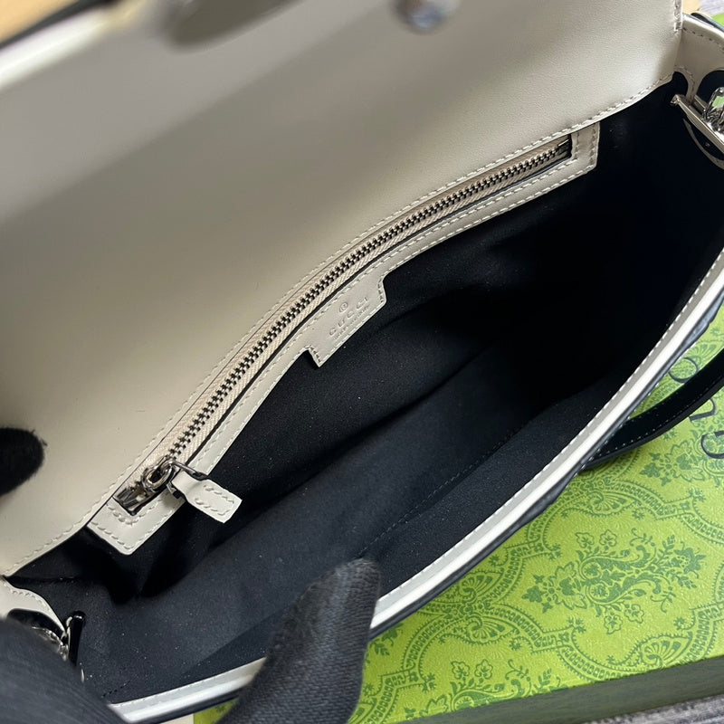 Side profile of refined statement women's handbag – women's premium purse