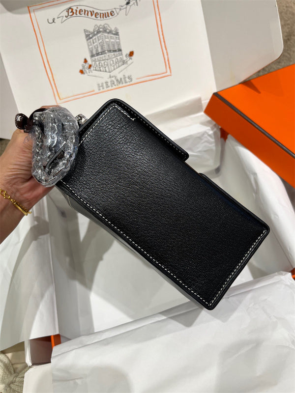  Streamlined crossbody bag carried on shoulder